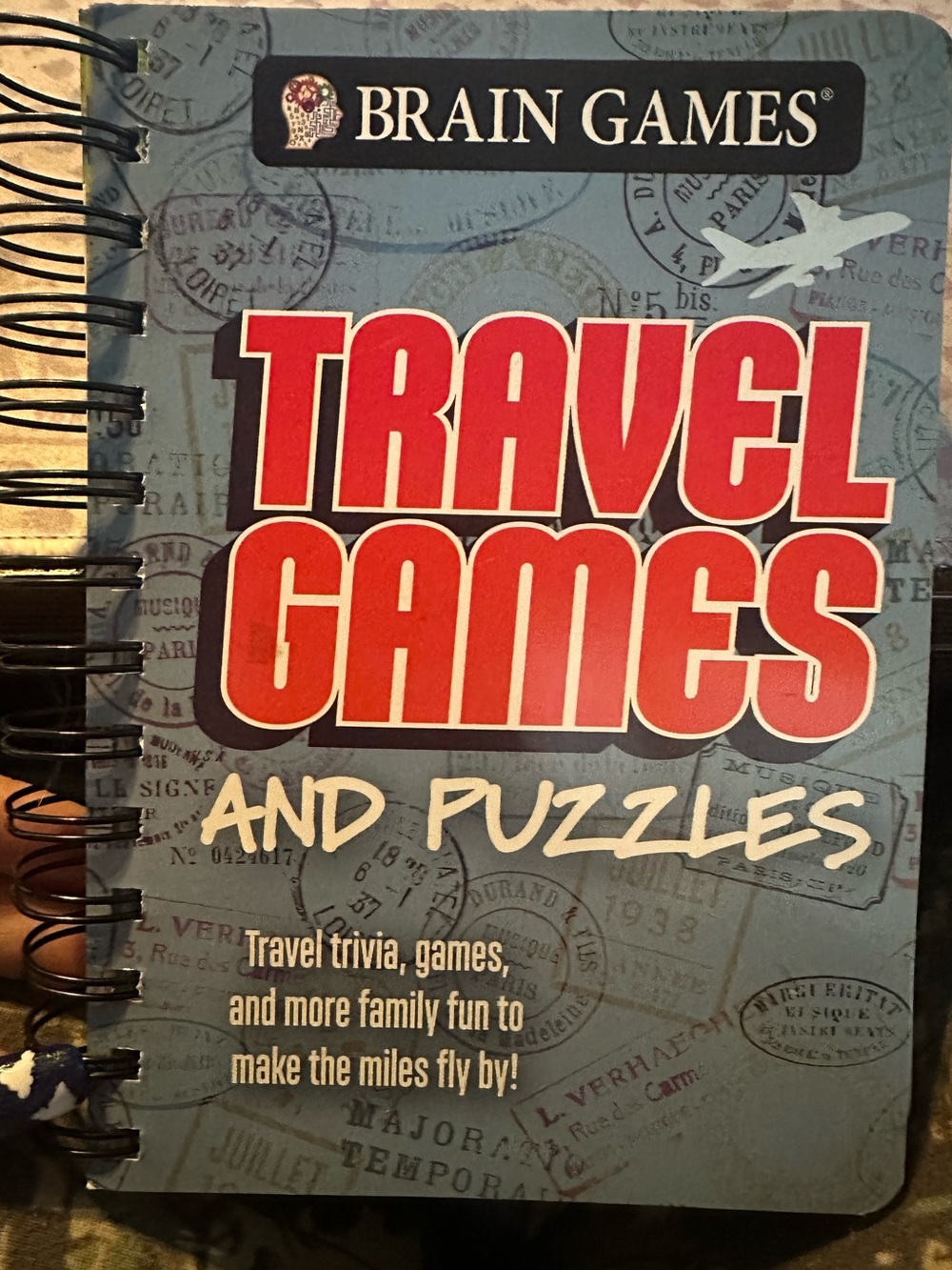Travel Games and Puzzles - Red and Blue Spiral Notebook